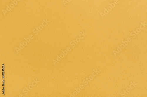 yellow paper texture background. texture of colored yellow paper