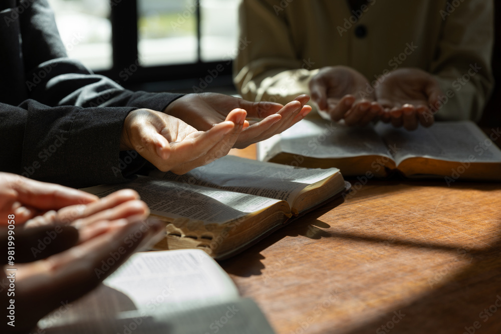 Christian group are praying to god with the bible and sharing the gospel, Believe in goodness, Spirituality and religion concept. Christian group are praying to god with the bible and sharing the gospel, Believe in goodness, Spirituality and religion concept.