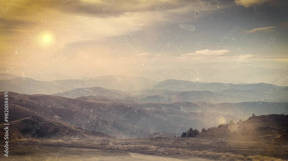 Stunning landscape of rolling hills beautifully covered with dense trees and shrubs, under a partly cloudy sky, and distant mountains visible in the background. Stunning landscape of rolling hills beautifully covered with dense trees and shrubs, under a partly cloudy sky, and distant mountains visible in the background.