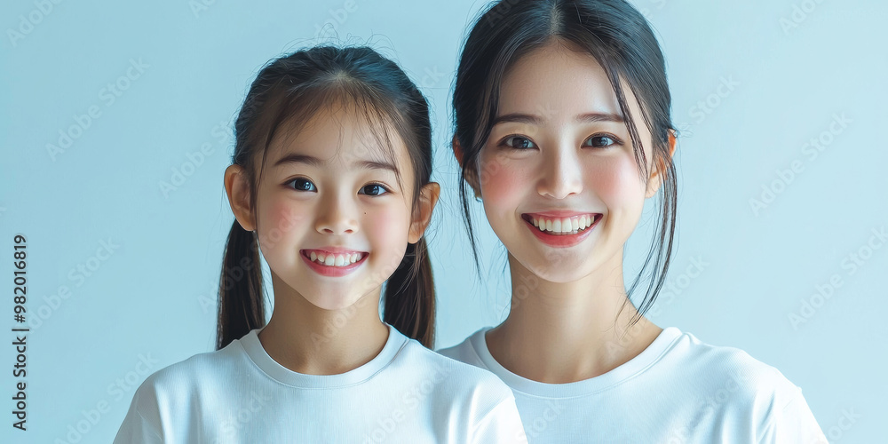 A young Japanese mother and daughter smiling, generative AI A young Japanese mother and daughter smiling, generative AI