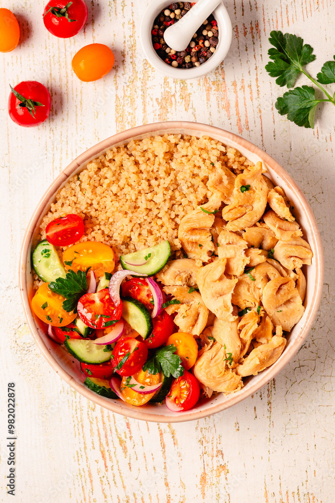 Bowl of quinoa with vegan soy meat and vegetables. Bowl of quinoa with vegan soy meat and vegetables.