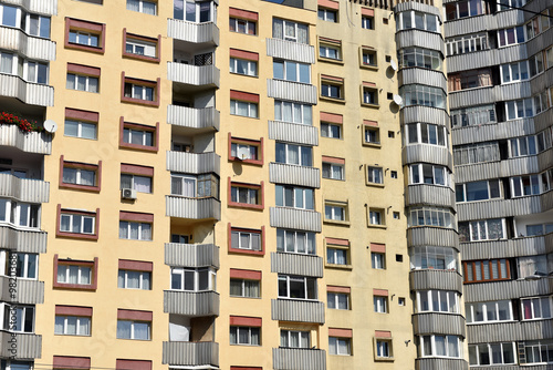 Typical facade of concrete panel building. Post Soviet flat of blocks