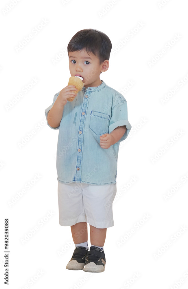 Cute little boy enjoying an ice cream cone while wearing casual clothes. Perfect for lifestyle, childhood, and food themes. Cute little boy enjoying an ice cream cone while wearing casual clothes. Perfect for lifestyle, childhood, and food themes.