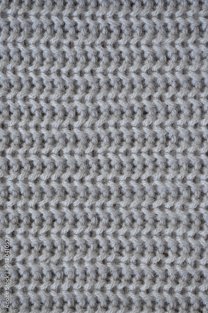 macro texture of woolen pastel crocheted sweater as background, close-up of brown crocheted front surface, woolen texture of woolen wool, trend pastel crocheted front surface macro texture of woolen pastel crocheted sweater as background, close-up of brown crocheted front surface, woolen texture of woolen wool, trend pastel crocheted front surface