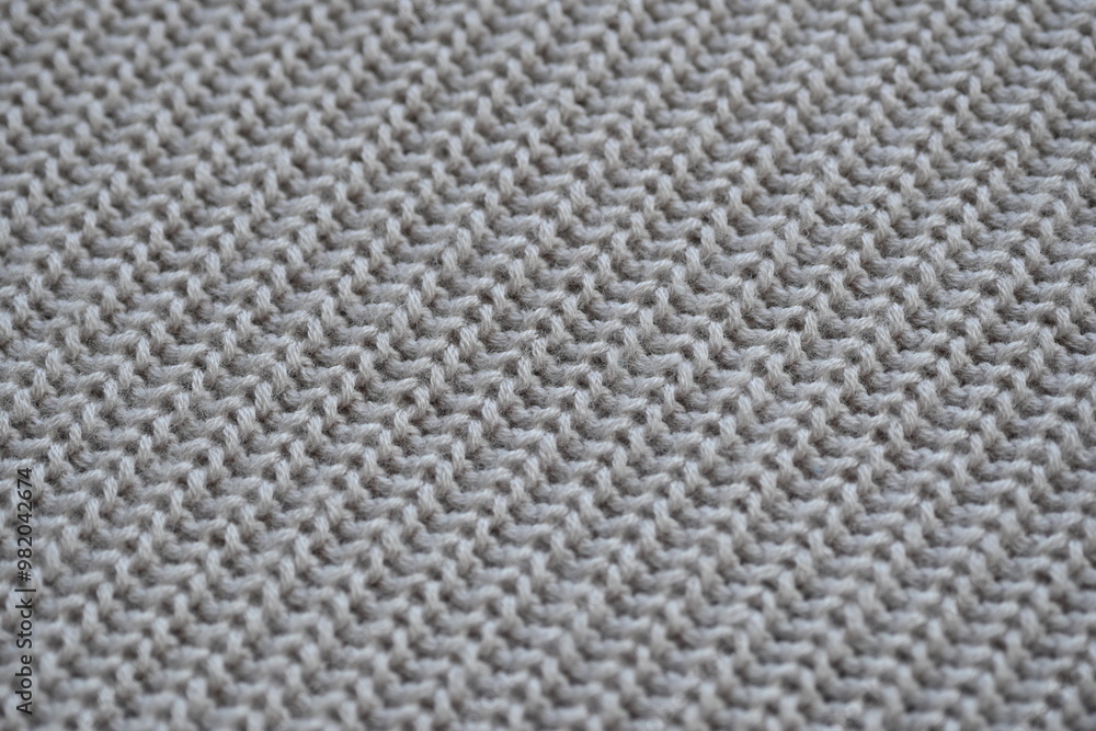 macro texture of woolen pastel crocheted sweater as background, close-up of brown crocheted front surface, woolen texture of woolen wool, trend pastel crocheted front surface macro texture of woolen pastel crocheted sweater as background, close-up of brown crocheted front surface, woolen texture of woolen wool, trend pastel crocheted front surface