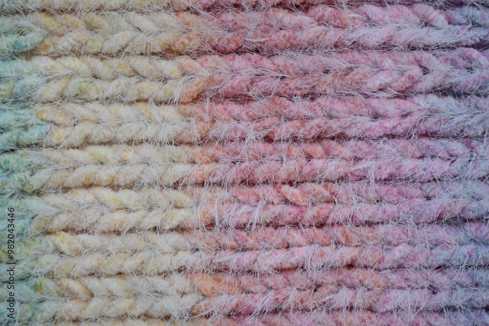 Macro texture of acrylic multicolored crocheted sweater as background, close up of rainbow front surface, multicolored crocheted wool texture, crocheted front surface Macro texture of acrylic multicolored crocheted sweater as background, close up of rainbow front surface, multicolored crocheted wool texture, crocheted front surface