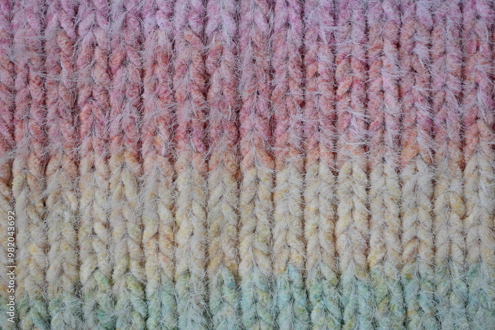 Macro texture of acrylic multicolored crocheted sweater as background, close up of rainbow front surface, multicolored crocheted wool texture, crocheted front surface Macro texture of acrylic multicolored crocheted sweater as background, close up of rainbow front surface, multicolored crocheted wool texture, crocheted front surface