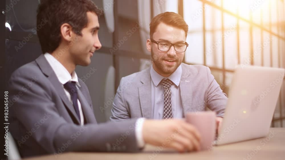 Learning from experience. Cropped shot of two corporate business colleagues having a meeting around the table in the boardroom. Learning from experience. Cropped shot of two corporate business colleagues having a meeting around the table in the boardroom.