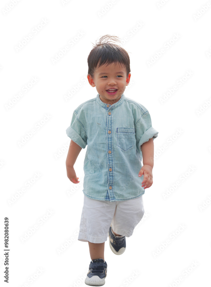 A smiling young boy in casual summer attire walking outdoors on a bright sunny day, enjoying his playful adventure. A smiling young boy in casual summer attire walking outdoors on a bright sunny day, enjoying his playful adventure.