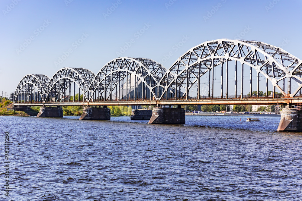Fototapeta premium Main Railway bridge across the Daugava river in Riga, the capital of Latvia.