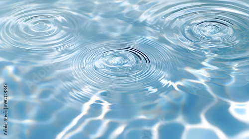 Abstract Ripples on the Surface of Water, a Close-up of Blue Water with Circular Wave Patterns Created by Droplets, a Serene Background Image