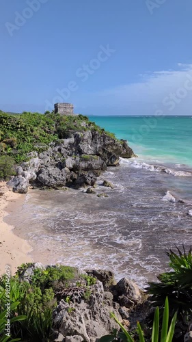 Tulum Ruins Overlooking a Serene Beach with Gentle Waves - Ancient Mayan Coastline