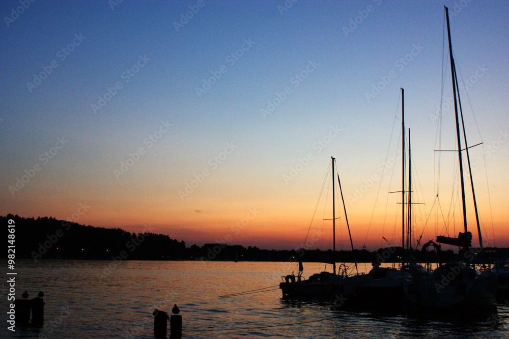 sunset sailing yacht sailboat moored to shore in port three masts sunset sailing yacht sailboat moored to shore in port three masts