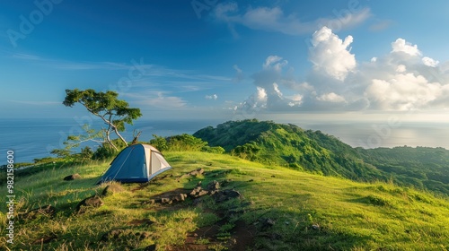 Camping on a mountain overlooking the ocean