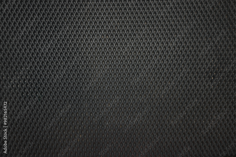Black rubber car mat as background, top view Black rubber car mat as background, top view