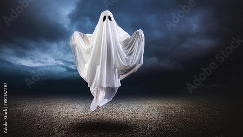 A ghost in a white sheet hovers in the air 