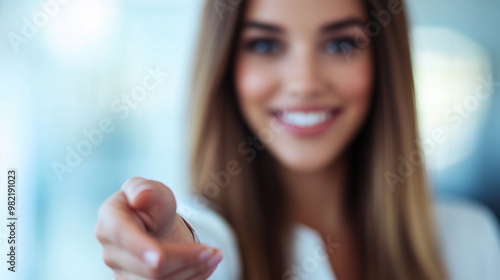 Wallpaper Mural Smiling businesswoman reaching out for a handshake, modern corporate office, partnership, teamwork, bright and inviting environment, copy space Torontodigital.ca