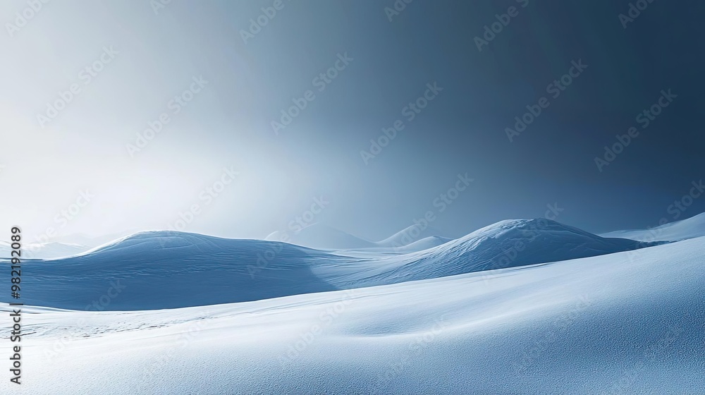 A serene winter landscape with smooth snow-covered hills under a soft, tranquil sky. Perfect for evoking calm and peace. A serene winter landscape with smooth snow-covered hills under a soft, tranquil sky. Perfect for evoking calm and peace.