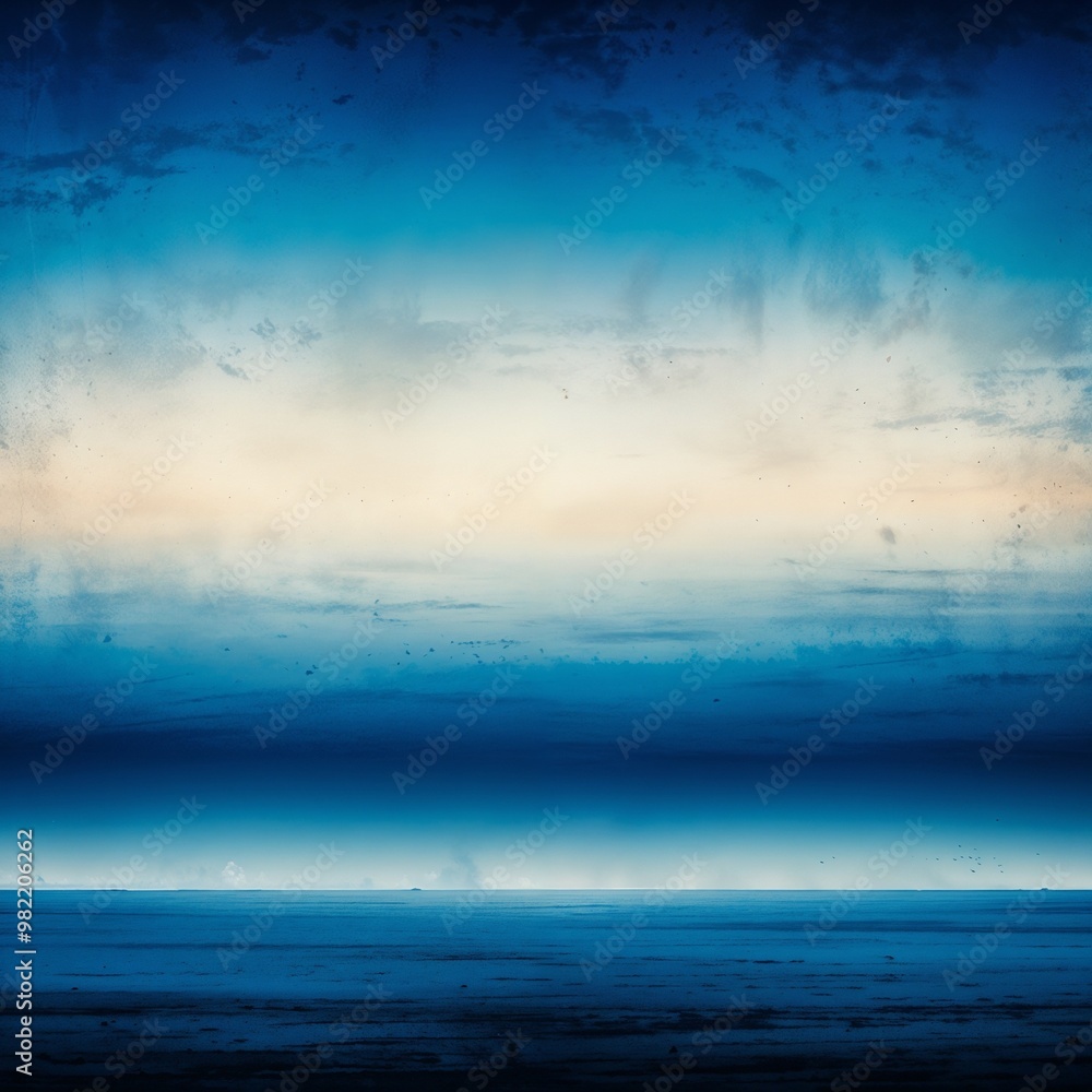 Obraz premium A stunning sunset over the ocean horizon with a soft gradient sky and calm water, perfect for travel, nature, or relaxation-themed designs. 