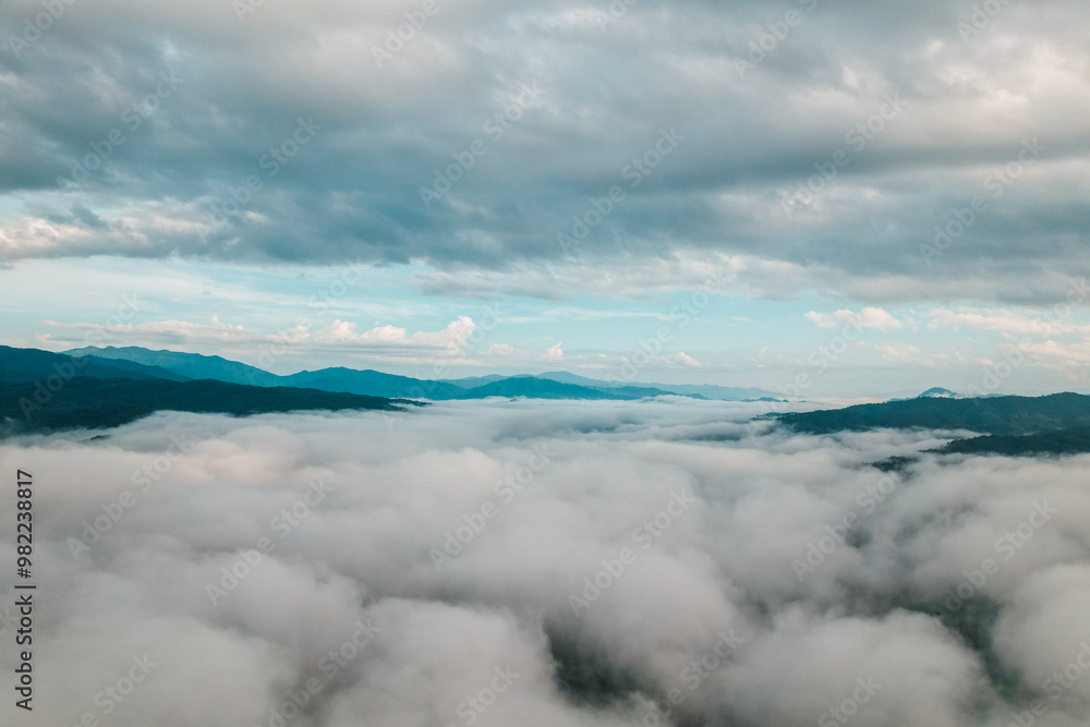 Fototapeta premium Aerial view of fog and morning sky from drone