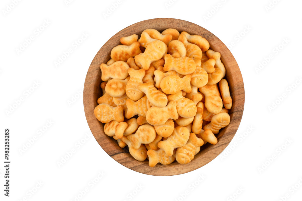 Yellow fish crackers on isolated white background.
