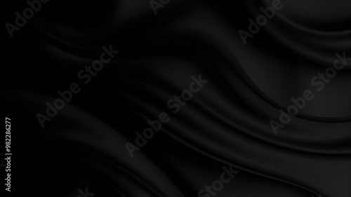 Abstract black silk waves creating an elegant textured background