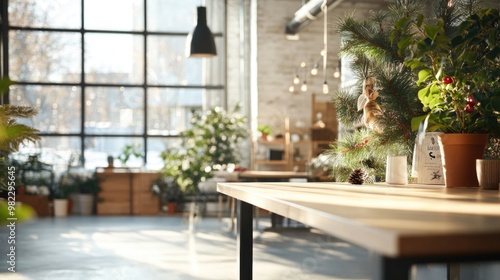 Open office space decorated for Christmas holidays with trees and ornaments, creating warm and festive atmosphere at workplace