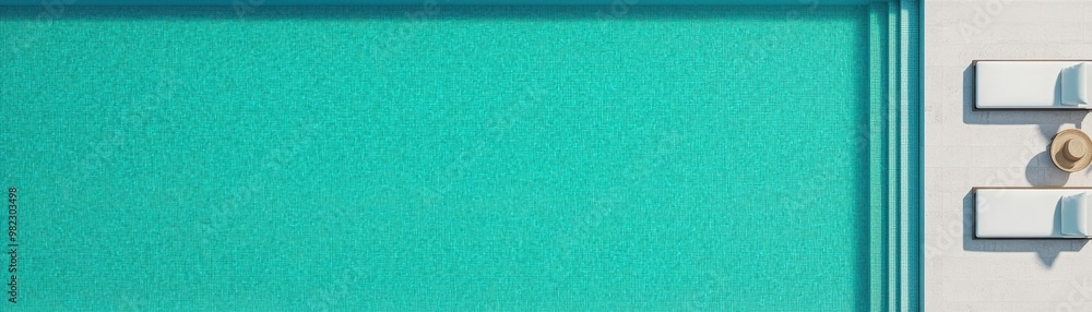 A vibrant turquoise wall with a sleek white door handle, creating a modern and refreshing aesthetic for interior design. A vibrant turquoise wall with a sleek white door handle, creating a modern and refreshing aesthetic for interior design.