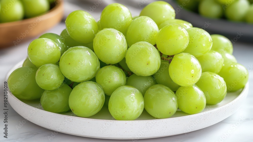 Fresh Green Grapes on White Plate Fresh Green Grapes on White Plate