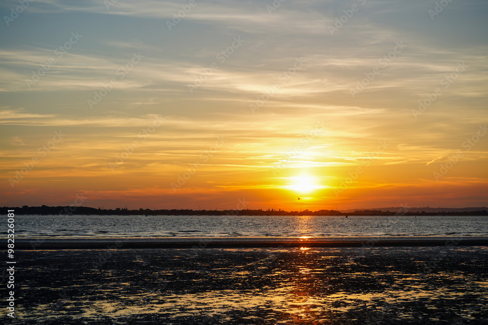 Sunset over a beach in the South of England Sunset over a beach in the South of England