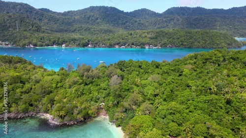 Emerald Waters Encircling a Tranquil Tropical Beach