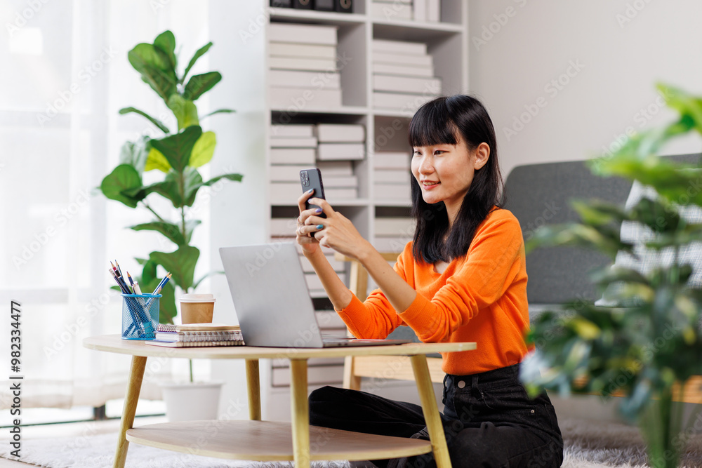 business woman talking with somebody while sitting at home and working on laptop. Happy business woman chatting on digital gadgets online, holding mobile phone, using laptop
business woman talking with somebody while sitting at home and working on laptop. Happy business woman chatting on digital gadgets online, holding mobile phone, using laptop