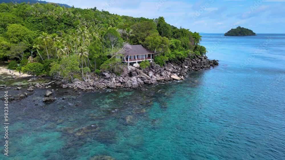 Tropical Island Bungalow with a View of the Emerald Green Sea Tropical Island Bungalow with a View of the Emerald Green Sea