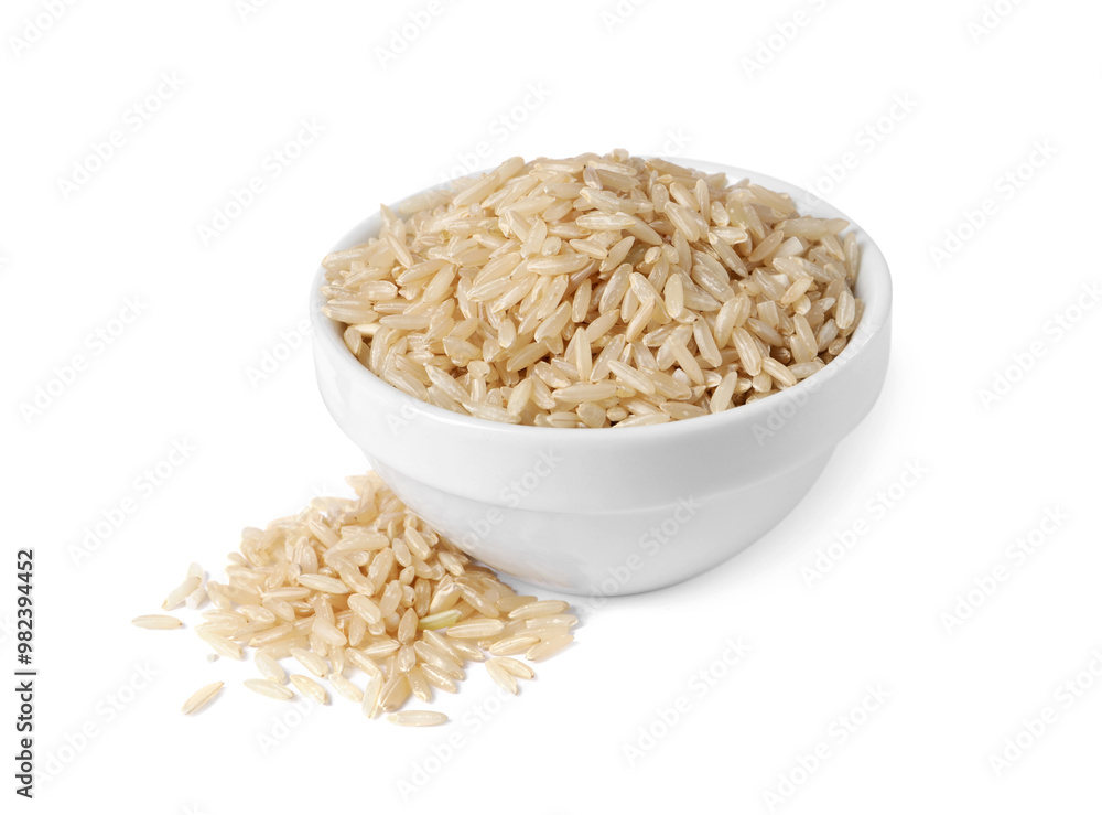 Raw rice in bowl isolated on white Raw rice in bowl isolated on white
