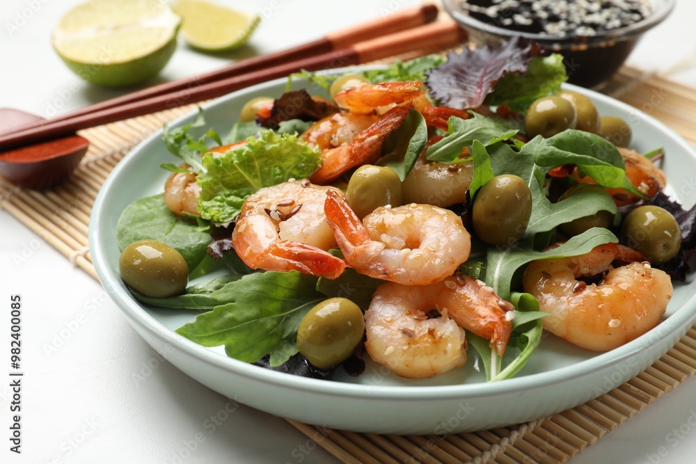 Delicious shrimp salad served on white table, closeup Delicious shrimp salad served on white table, closeup