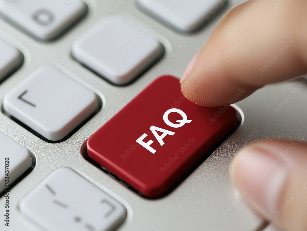 3D rendering a close-up of a keyboard featuring a striking red FAQ button surrounded by white keys, symbolizing urgency and importance, with a finger poised to touch it for quick access . 3D rendering a close-up of a keyboard featuring a striking red FAQ button surrounded by white keys, symbolizing urgency and importance, with a finger poised to touch it for quick access .