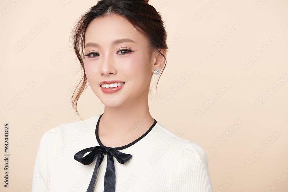 Beautiful young asian woman with clean fresh skin on beige background, Face care, Facial treatment, Cosmetology, beauty and spa, Asian women portrait. Beautiful young asian woman with clean fresh skin on beige background, Face care, Facial treatment, Cosmetology, beauty and spa, Asian women portrait.