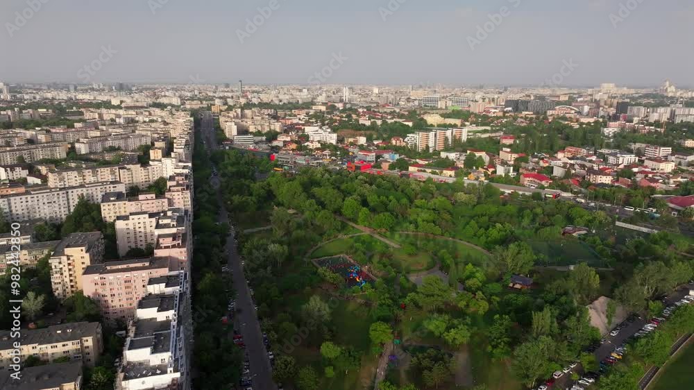 Bucharest 4K video from above. Aerial video with the landscape of Crangasi Park next to Morii Lake (Lacul Morii in Romanian) during a beautiful summer day. Travel to Bucharest. Bucharest 4K video from above. Aerial video with the landscape of Crangasi Park next to Morii Lake (Lacul Morii in Romanian) during a beautiful summer day. Travel to Bucharest.