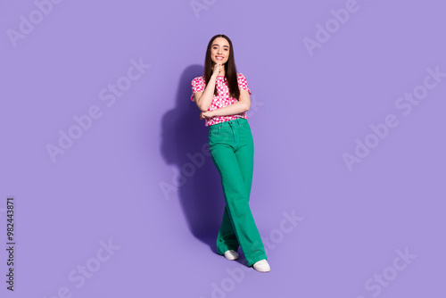 Full body portrait of nice young woman contemplate wear checkered t-shirt isolated on violet color background