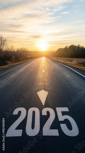 Road to "2025" with an empty road with written "2025" and arrow pointing towards the horizon to represent the future and positivity and success of the new year 2025