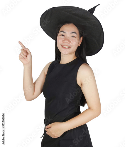 Young woman wearing witch costume with hand pointing gesture isolate on transparent background