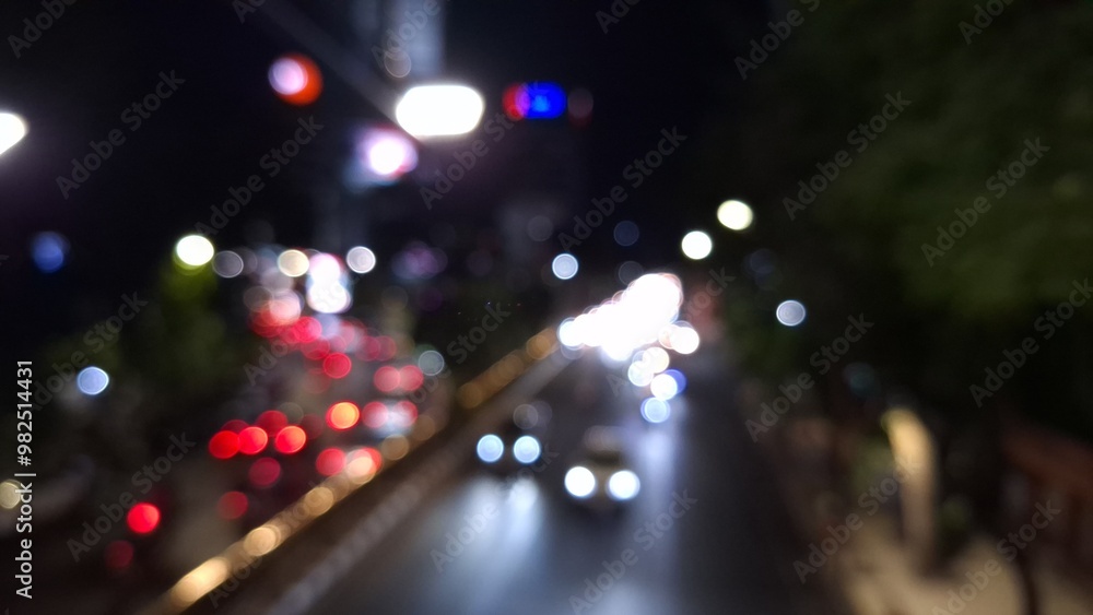 aerial view of blurred Bokeh traffic light at night in the street of a big city aerial view of blurred Bokeh traffic light at night in the street of a big city