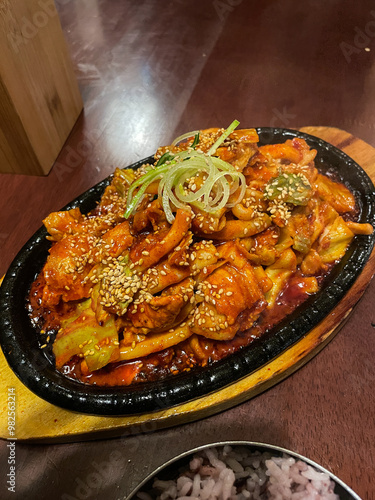 Sizzling hot red spicy chicken. photo