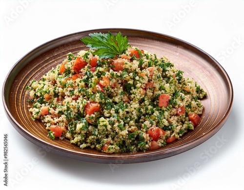 Tabouleh on plate isolated on white background photo