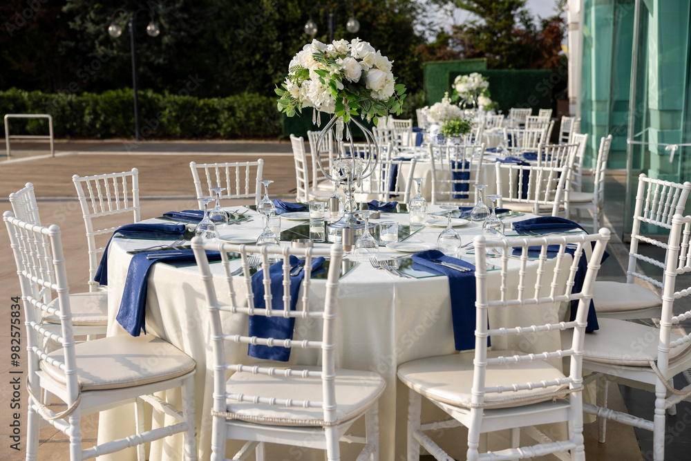 Elegant Outdoor Wedding Stage with Pink and White Floral Decor Overlooking City