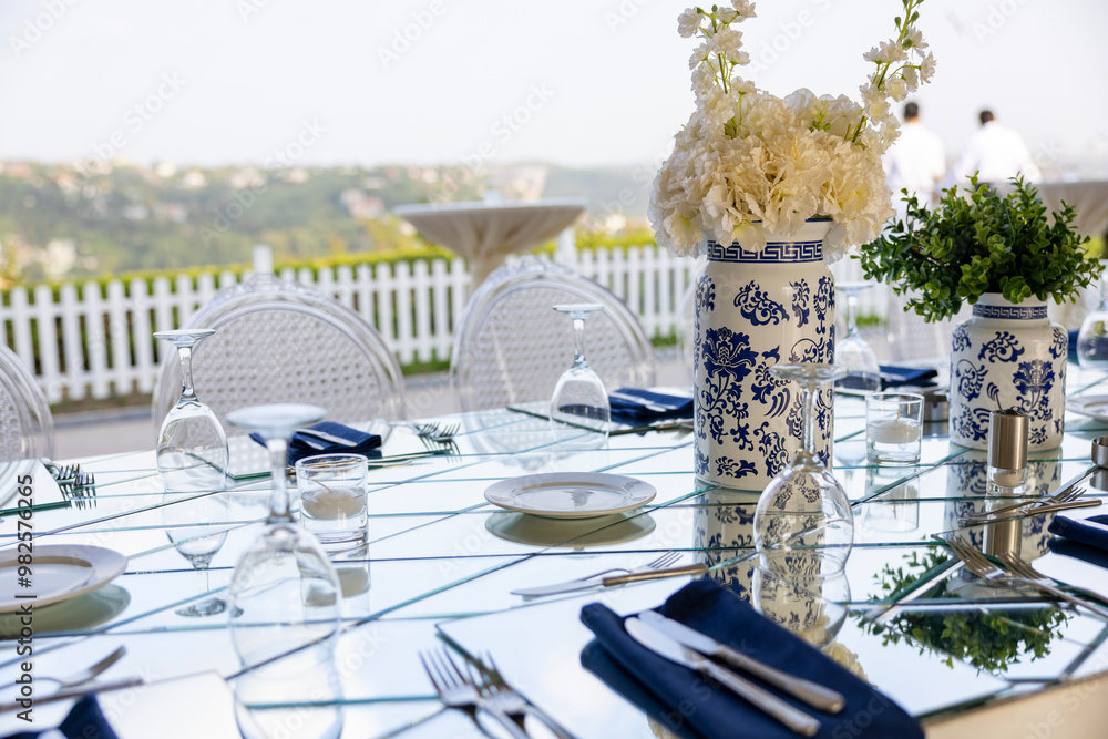 Elegant Outdoor Wedding Stage with Pink and White Floral Decor Overlooking City