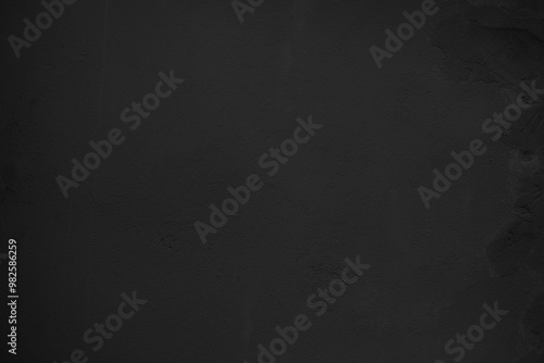 Black grunge background. Old cement wall tetxure photo