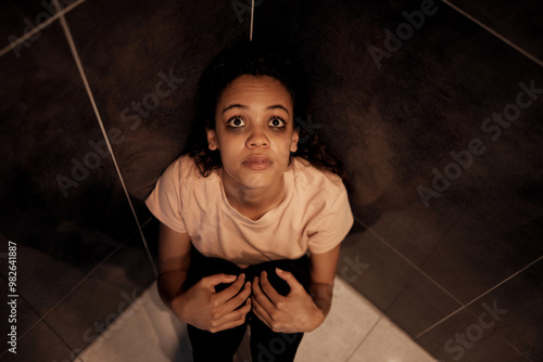 Photos Woman, paranoid and stress for scared, hallucination and trauma in house with insomnia, crisis and mental health