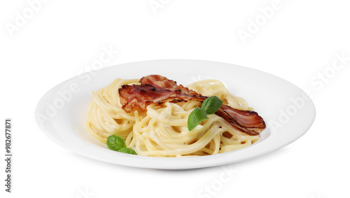 Delicious pasta Carbonara with bacon and basil isolated on white