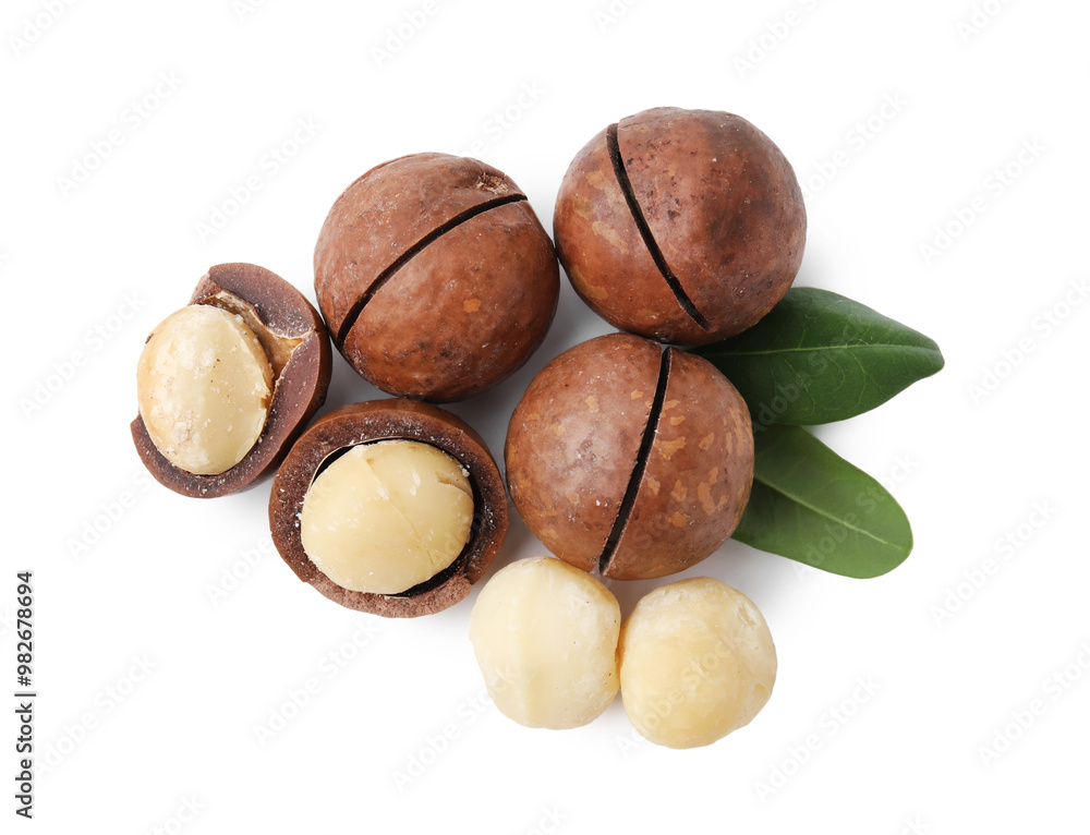 Macadamia nuts with shells isolated on white, top view Macadamia nuts with shells isolated on white, top view
